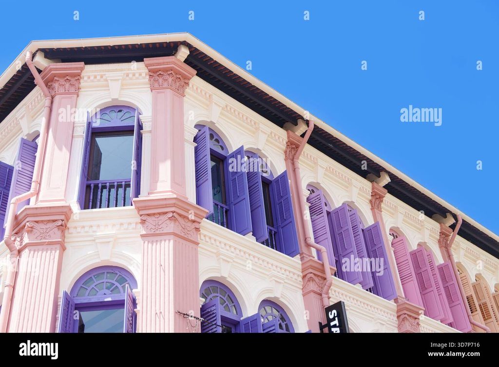 Purple Building With A Lot Of Windows Pink Pyramid Roof